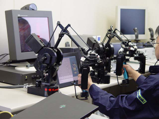 Illustration for article titled Human Drives Robot Dressed as Human Driving a Digger (Verdict: We Dig It)